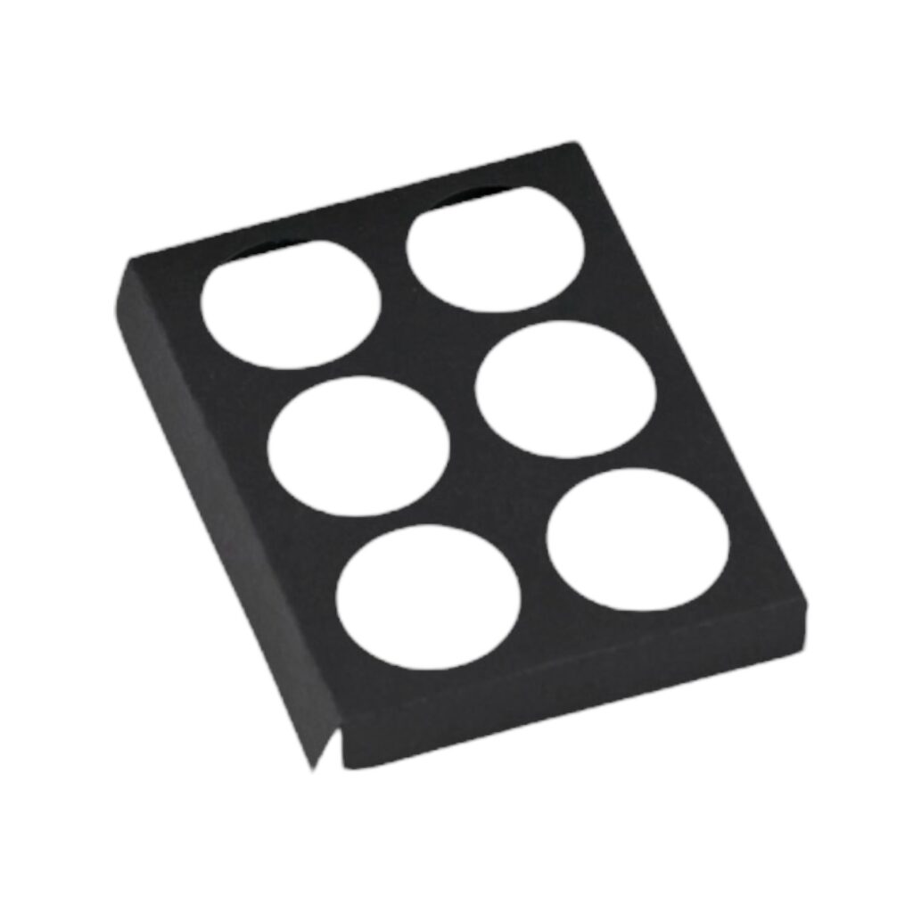 Inlay met gaten voor luxe bonbondoos met vakken